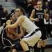 Saline High School senior Caitlin Ellis tries to steal the ball in the game against Woodhaven on Tuesday, March 5. Daniel Brenner I AnnArbor.com